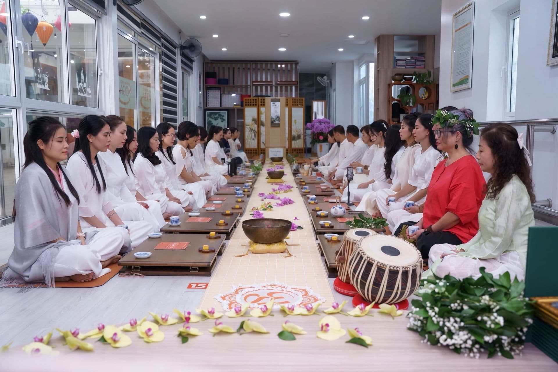 Group practicing yoga and tea in a Mermaid space